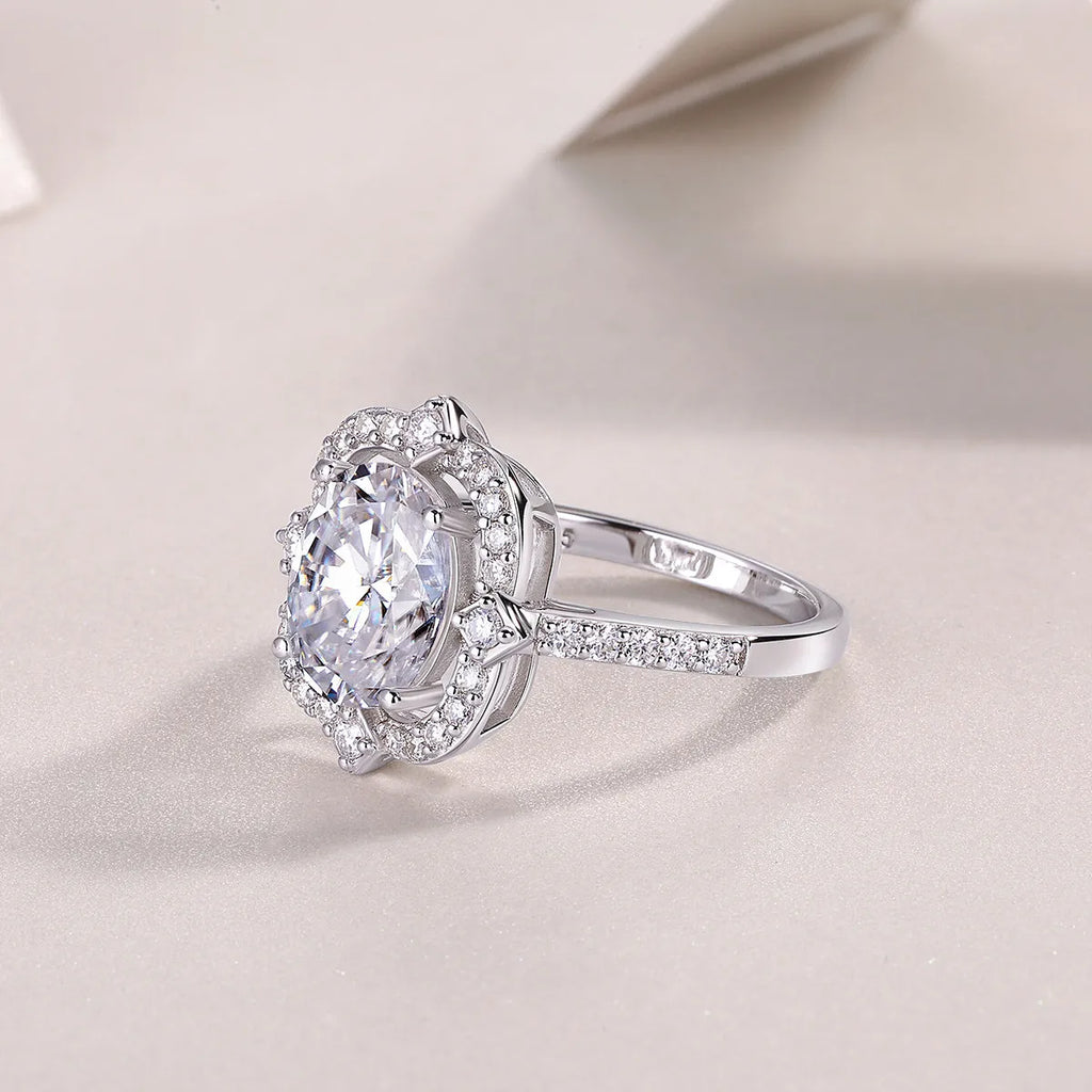 Camellia moissanite wedding ring with egg-shaped 8x10mm stone in S925 silver platinum-plated setting