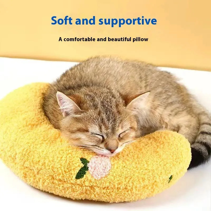 Blue U-shaped cat neck protection pillow with moon design on cloth material
