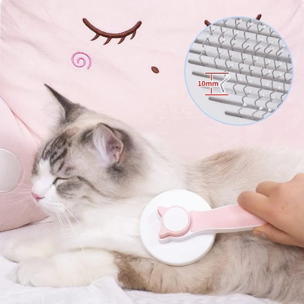 Blue self-cleaning cat brush with a rubber handle and a one-click button for hair removal.