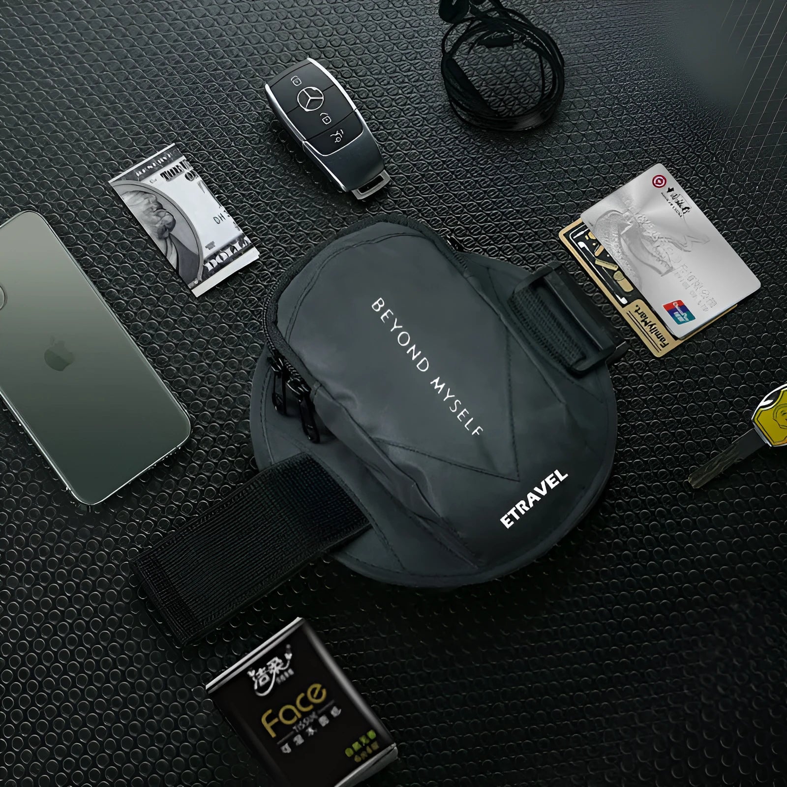 Running arm bag in reflective black colour with 7-inch capacity for smartphones