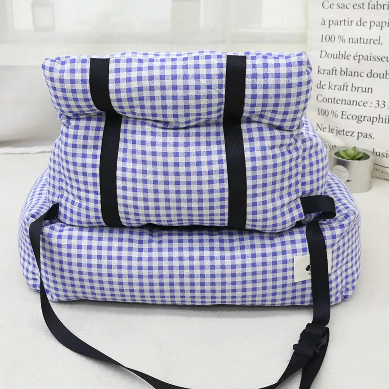 Blue plaid and grey cloth dog car seat nest shown in small and large sizes.