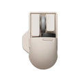 Xiaoqiao Tofu coloured wireless mouse with ergonomic shape on a desk