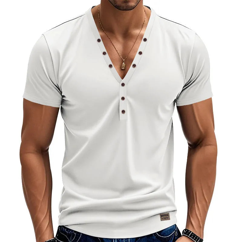 Man wearing a loose grey V-neck T-shirt with button detail on the front.