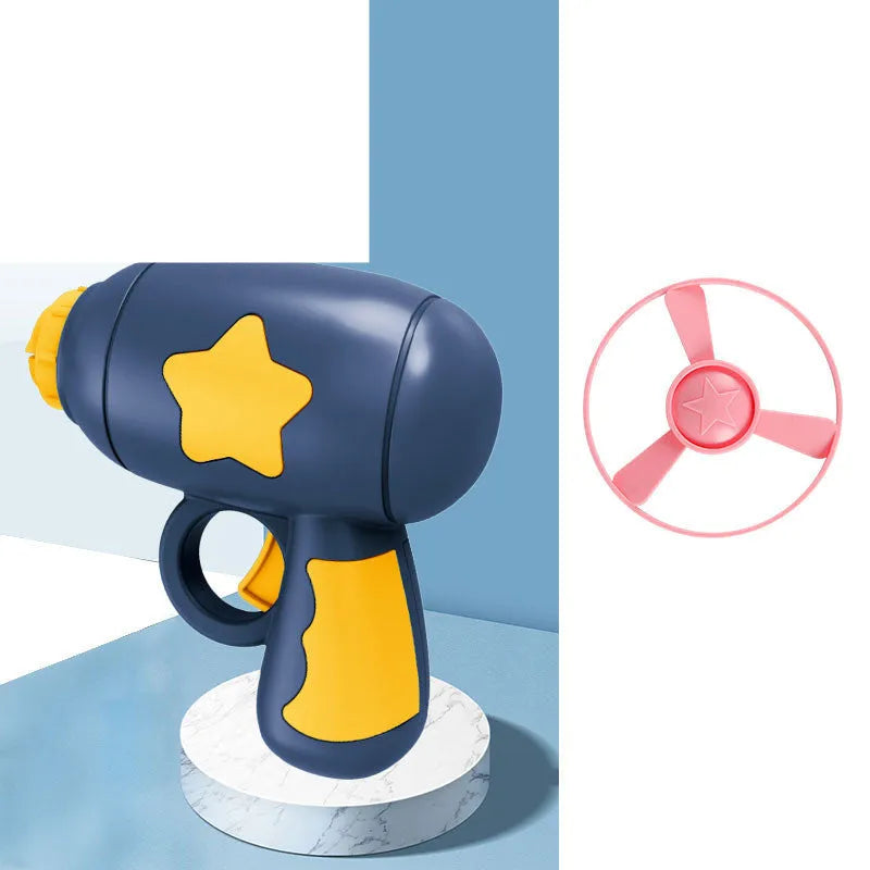 Flying saucer launcher toy with three blue flashing LED discs and target board on blister card