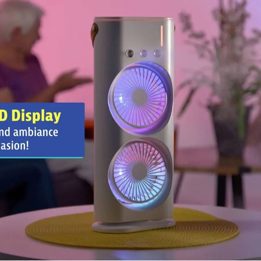White double-ended spray fan with humidifying mist and remote control on a desk