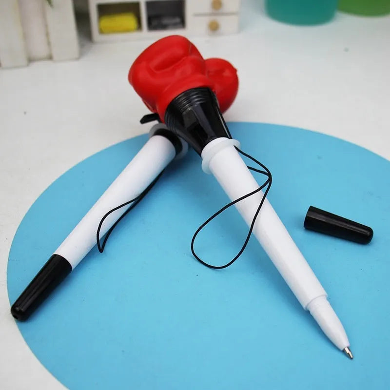 Four boxing press ejection pens with plug-in sleeve mechanisms and 0.7mm bullet tips