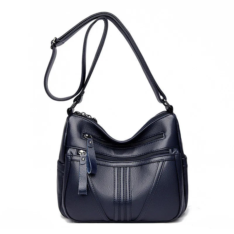 Genuine leather horizontal square shoulder messenger bag with stitching and contrast colour details in black