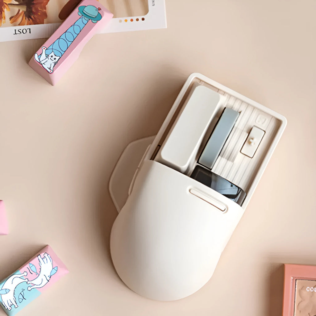 Xiaoqiao Tofu coloured wireless mouse with ergonomic shape on a desk