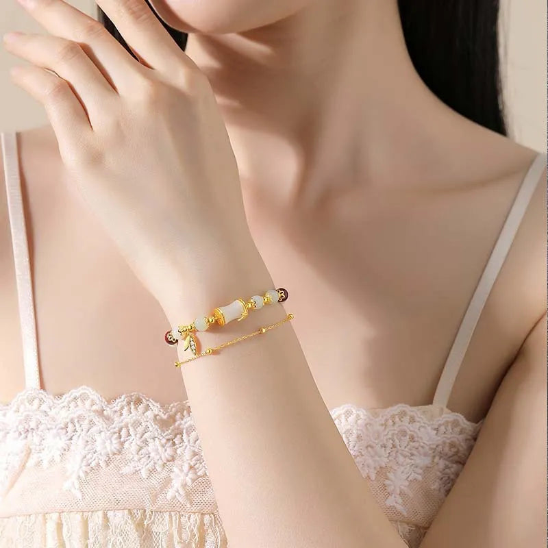 Retro unisex glass coloured glaze bracelet with flower-shaped Ruyi charm in green and electroplated finish