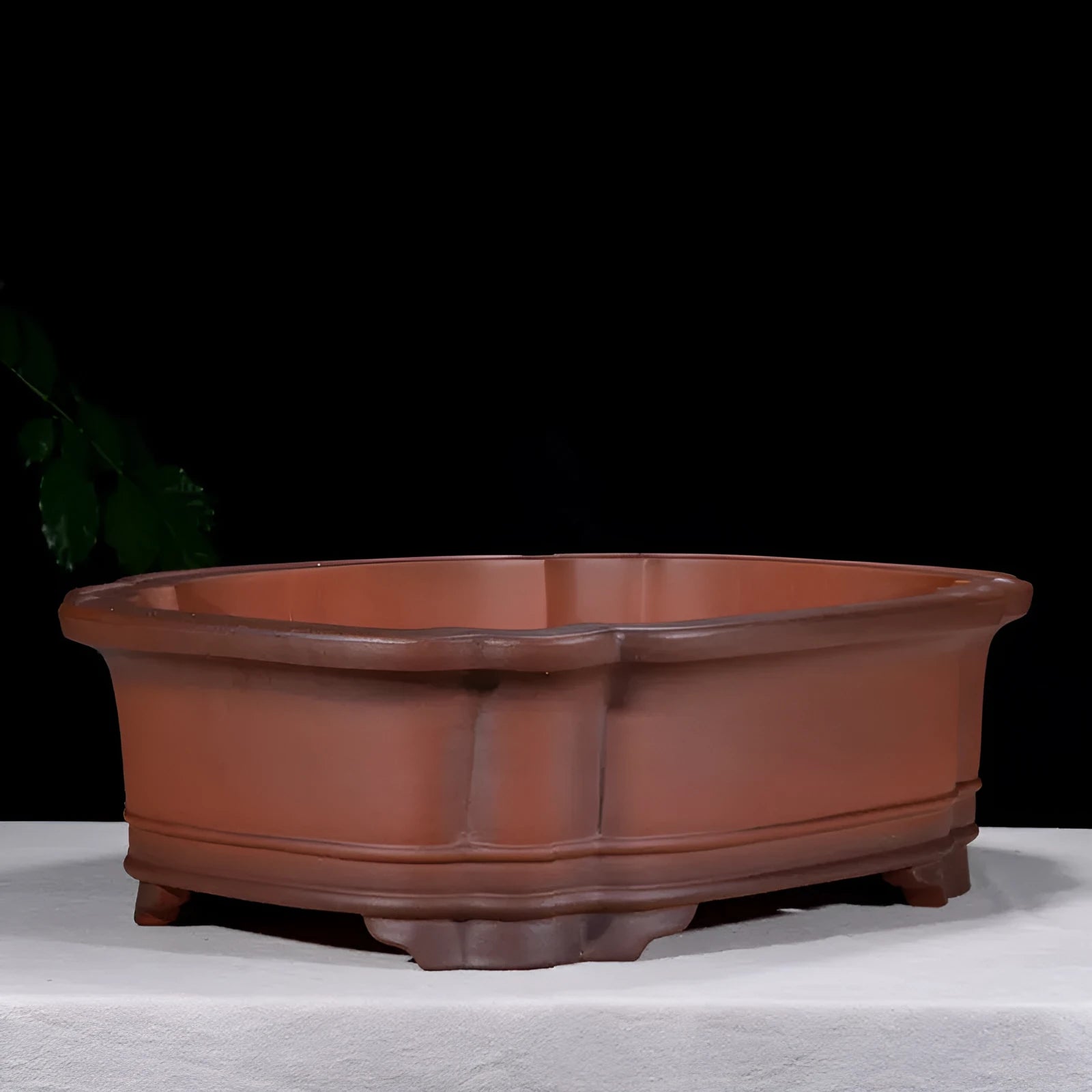 Large antique Chinese style purple clay flower pot with tree stump design and decorative botanical relief