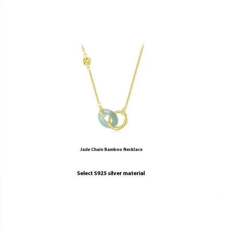 Handmade S925 sterling silver bamboo joint peace buckle necklace with pearl element on adjustable O-ring chain against neutral background