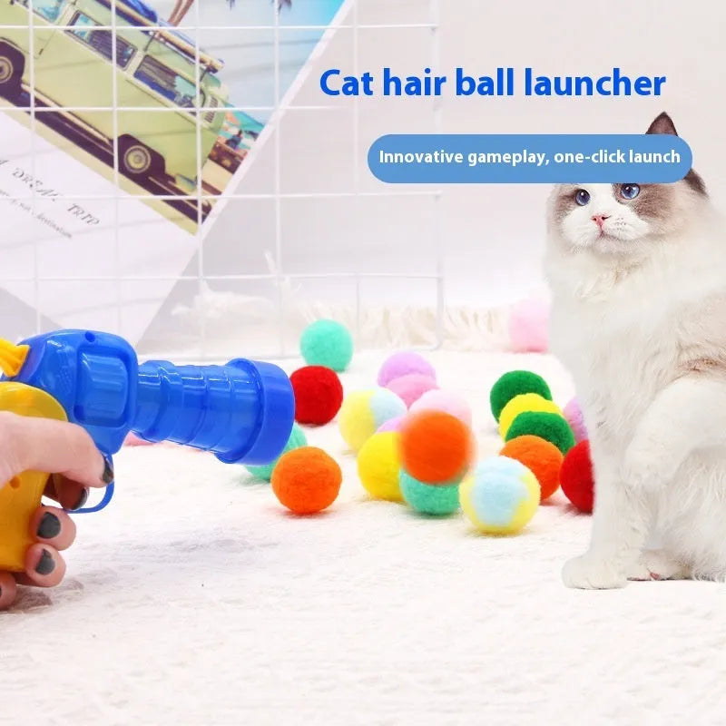 Plush pet toy launch gun with colourful yarn balls for indoor cat and dog play
