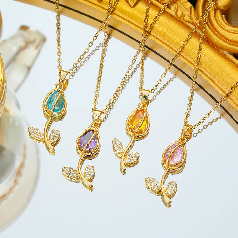 Gold-toned zircon tulip pendant necklace on titanium steel O-ring chain with adjustable 41-50cm length