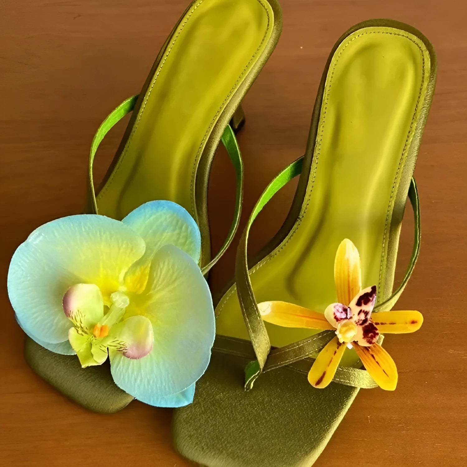 Handmade women's high heel semi-slipper sandals with asymmetric flower detail, calf leather upper, square toe, and EVA sole in black, green, pink, and white