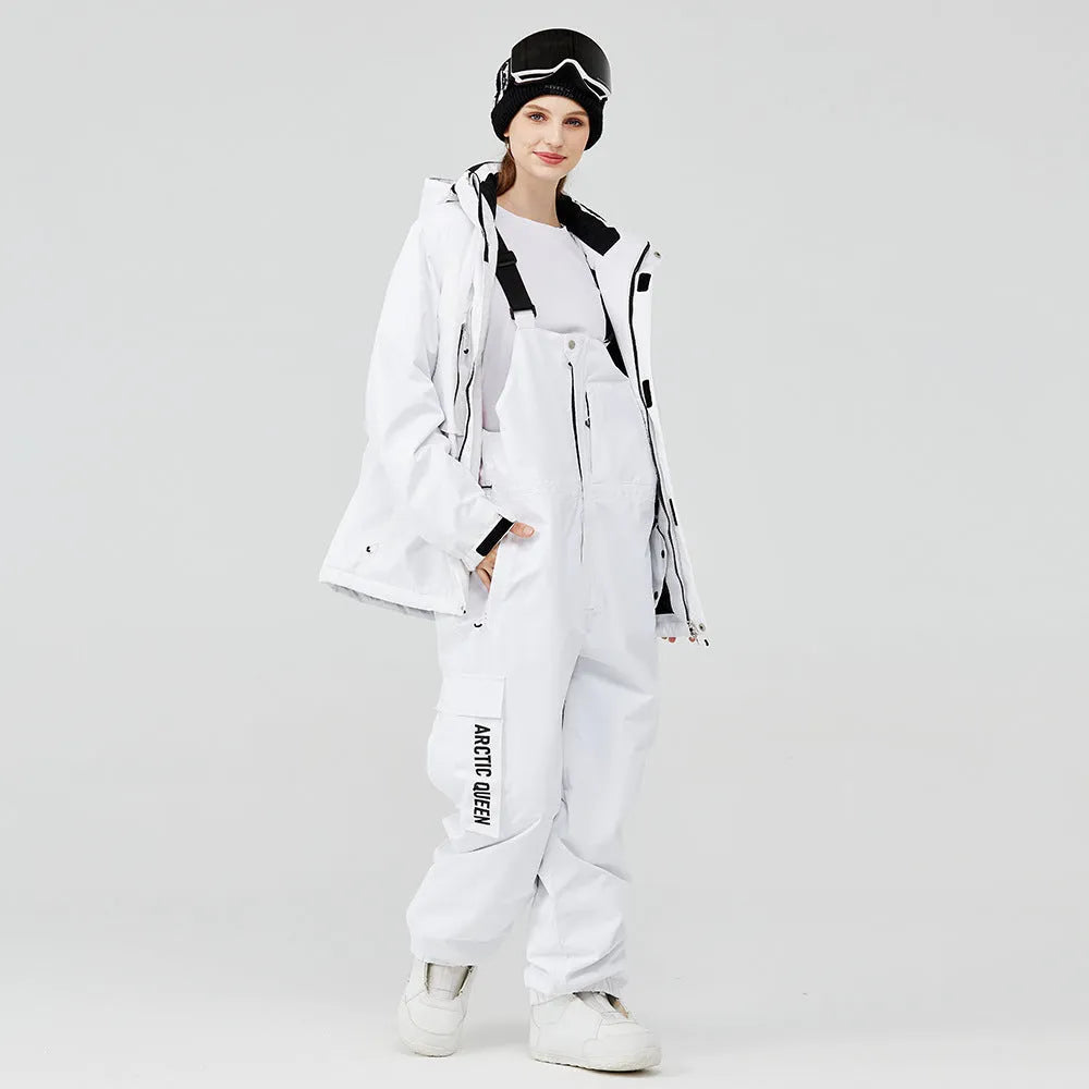 Unisex waterproof ski suit in blue top with black pants for winter snow sports