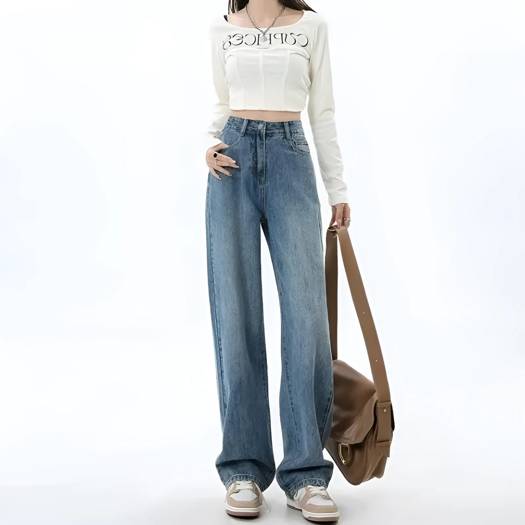 Women's retro blue wide leg jeans with high waist and straight leg design on denim background