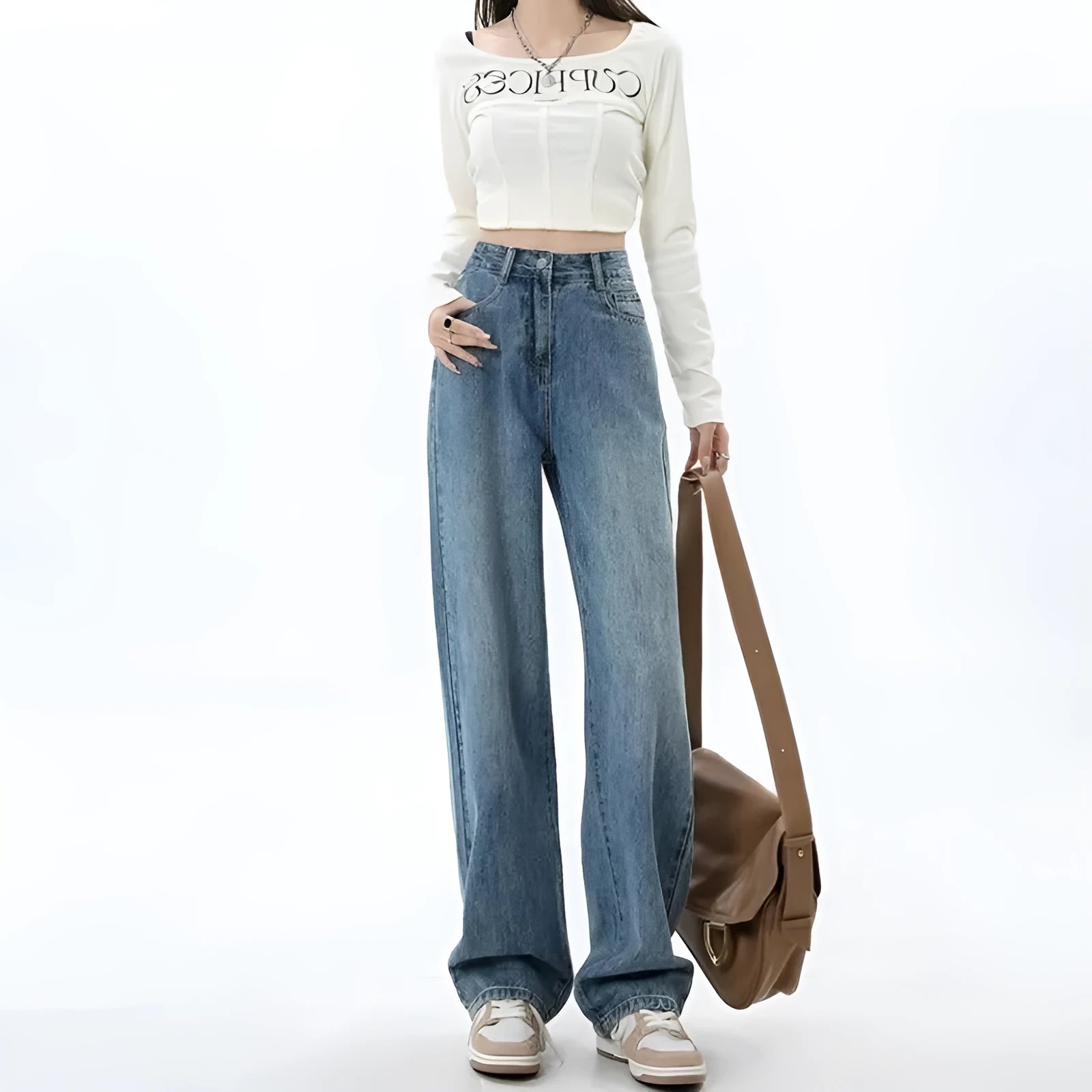 Women's retro blue wide leg jeans with high waist and straight leg design on denim background