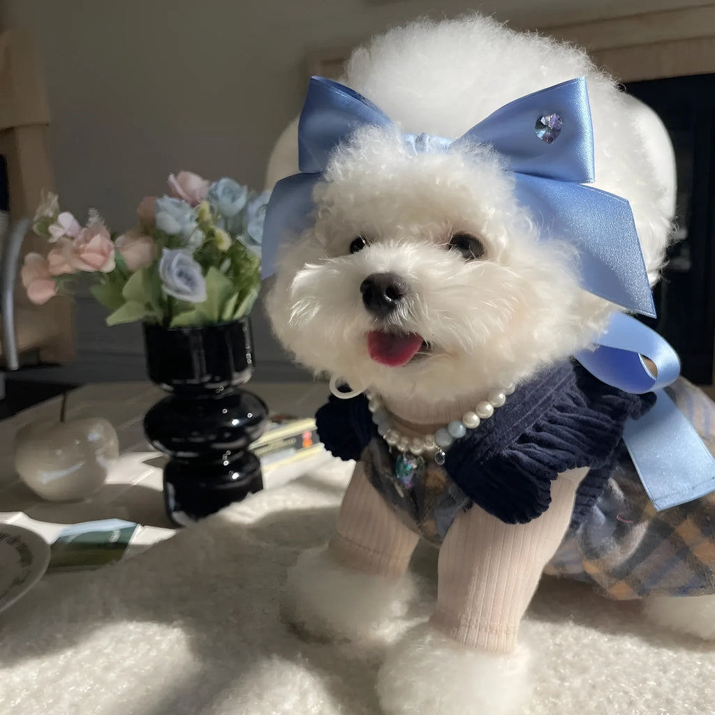 Princess style bow dog hair band with adjustable tension on blue polyester cotton ribbon