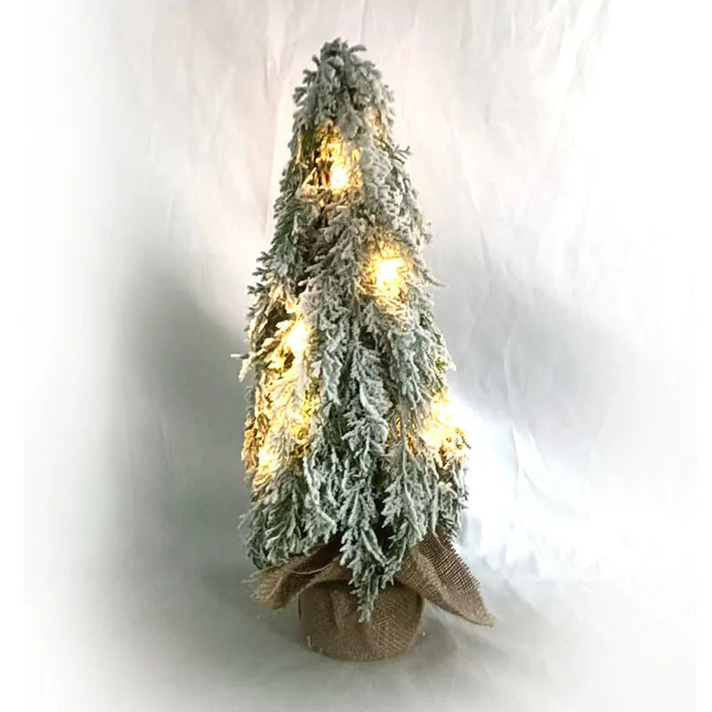 24-inch green PE plastic Christmas tree with lights and snow spray decoration on desktop