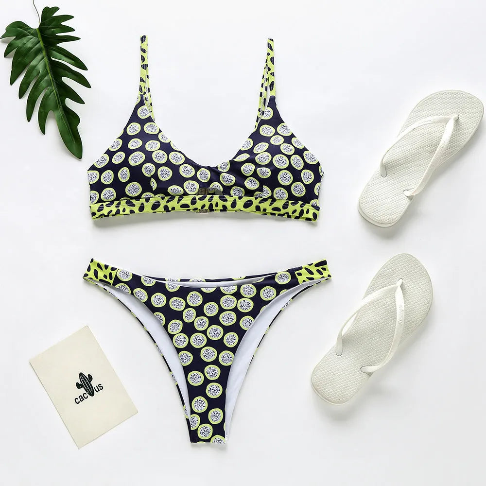 Women's black and white dot bikini and red and white stripe bikini set on a mannequin.