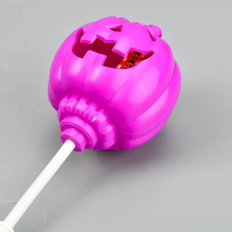 Plastic pumpkin lamp with USB cable, purple or yellow light option, 8.3cm wide by 22cm tall
