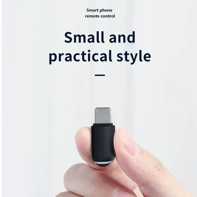 Black capsule-shaped infrared remote control with Lightning, Type-C, and Micro-USB ports.