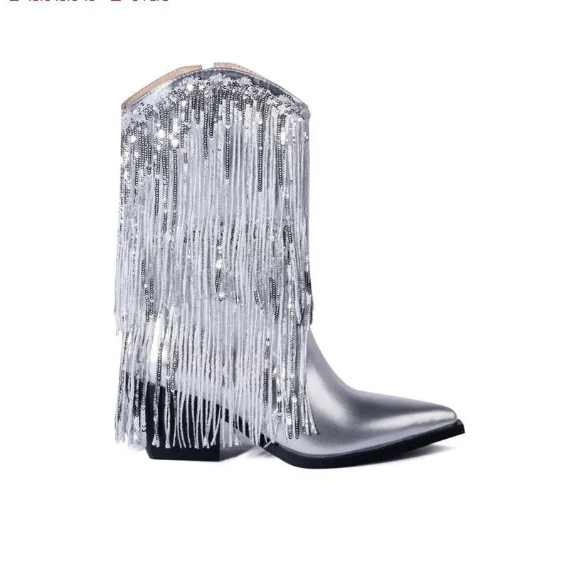 Women's black chunky heel tassel ankle boots with a pointed toe and super high stiletto heel.