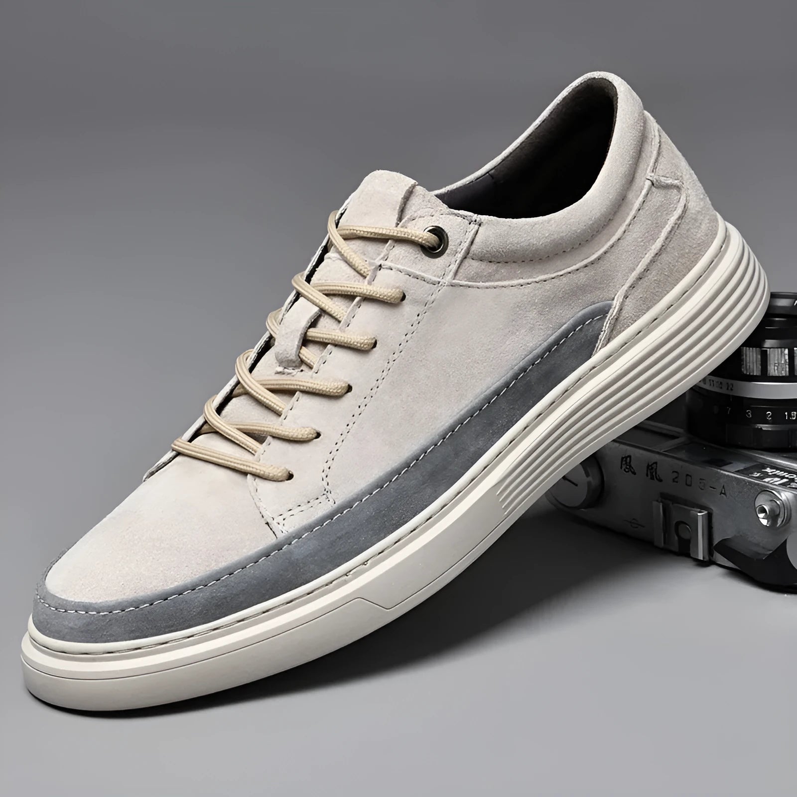 Men's grey casual leather skate shoes with lace-up front and rubber sole