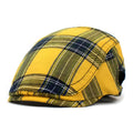 Retro plaid beret in red with curved brim and dome crown on adult head
