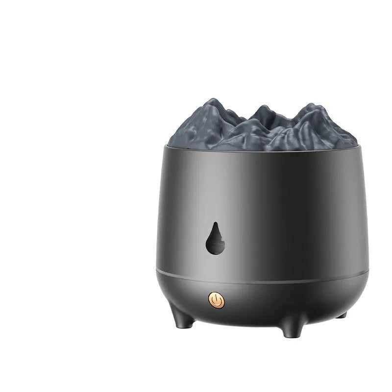 White volcano-shaped ultrasonic humidifier on a wooden desk, USB powered for home fog use