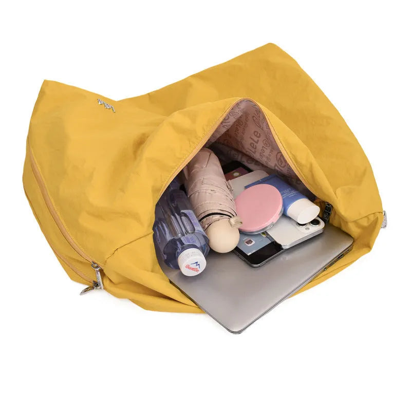 Heart-shaped women's nylon underarm bag in black, yellow, khaki, or blue with shoulder strap