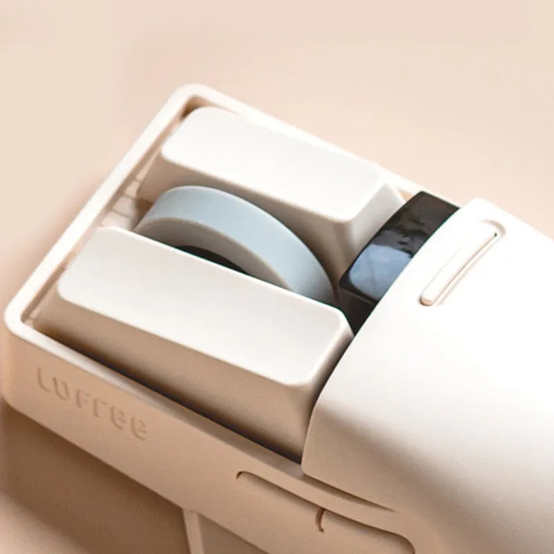 Xiaoqiao Tofu coloured wireless mouse with ergonomic shape on a desk
