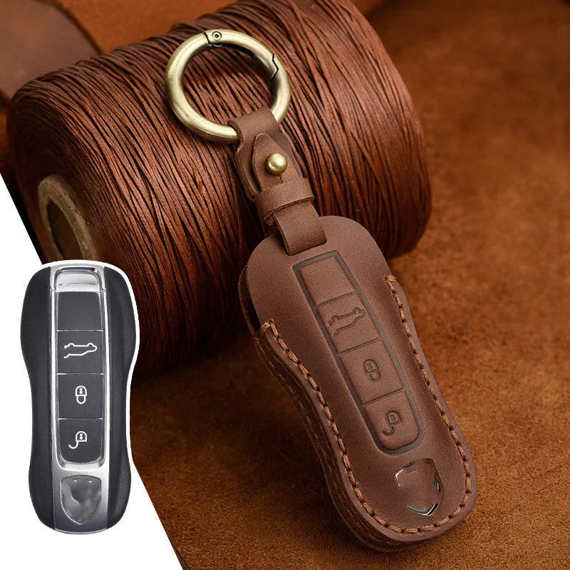 Authentic brown cowhide leather Porsche key cover with a retro metal bag buckle closure.