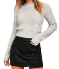 Men's slim fit knitted pullover sweater in light grey, showing round neck and long sleeves.