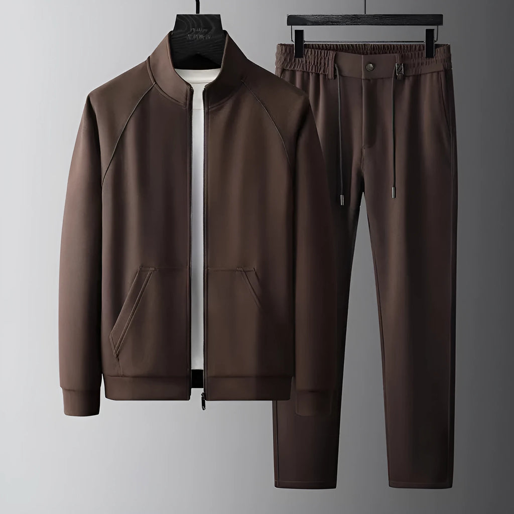 Men's slim fit stand collar casual sports suit set in a choice of colours, featuring a coat and matching trousers.