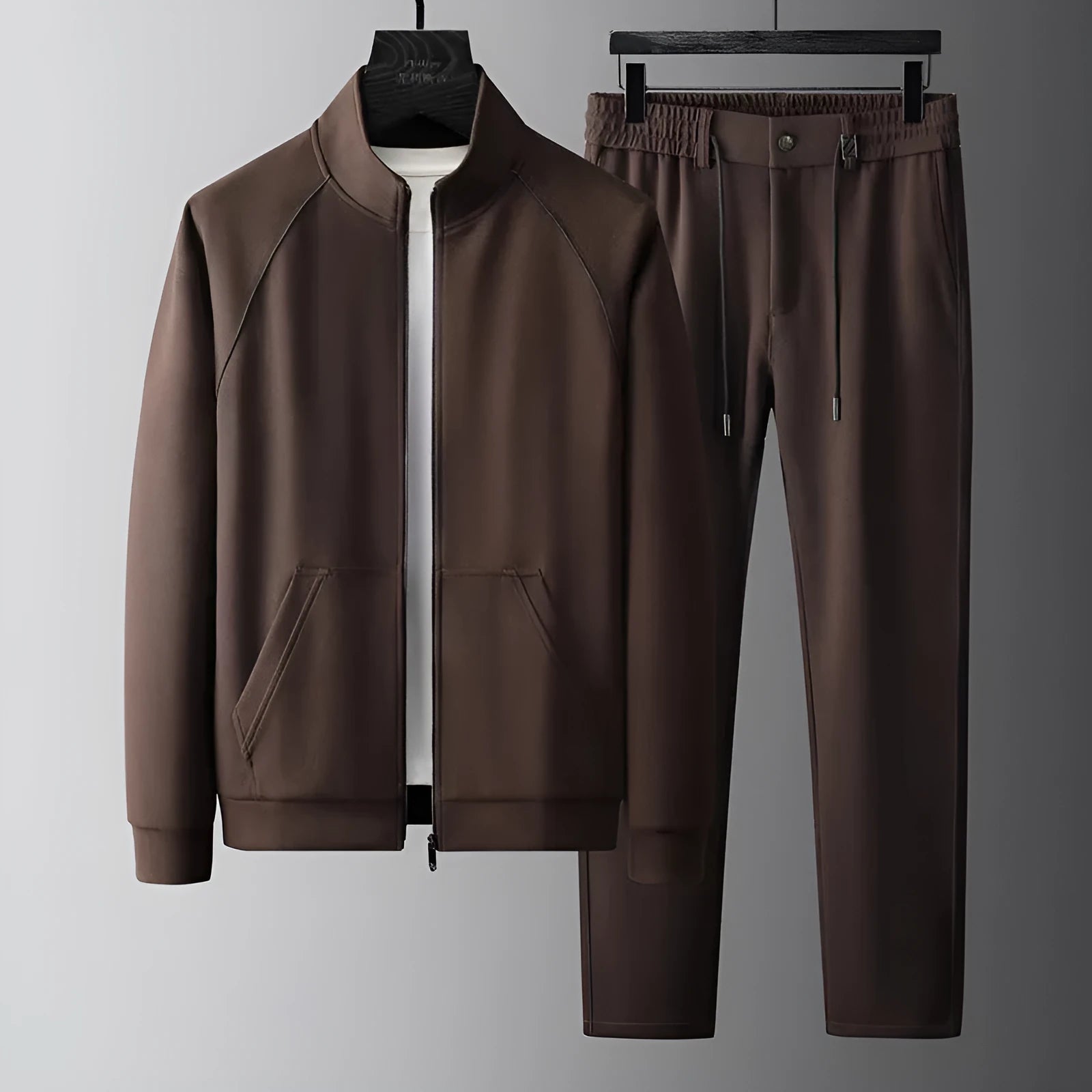 Men's slim fit stand collar casual sports suit set in a choice of colours, featuring a coat and matching trousers.