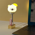 Cartoon animal USB night light with remote control showing bear, rabbit, duck and kitten designs