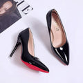 Women's solid colour pointed toe stiletto pump on a white background.
