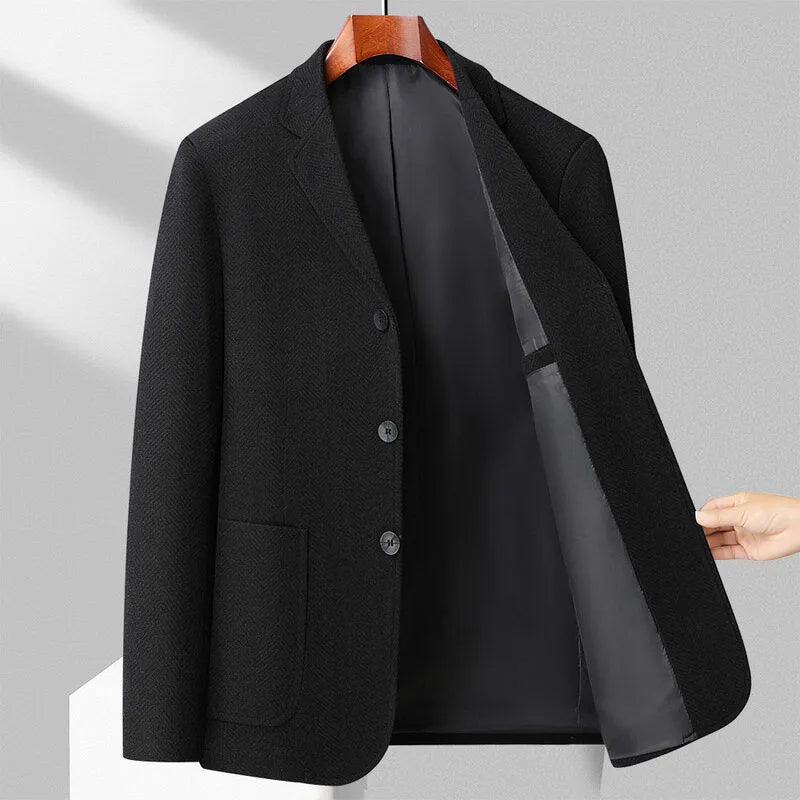 Men's loose fit solid colour wool blend coat for casual spring and autumn wear.