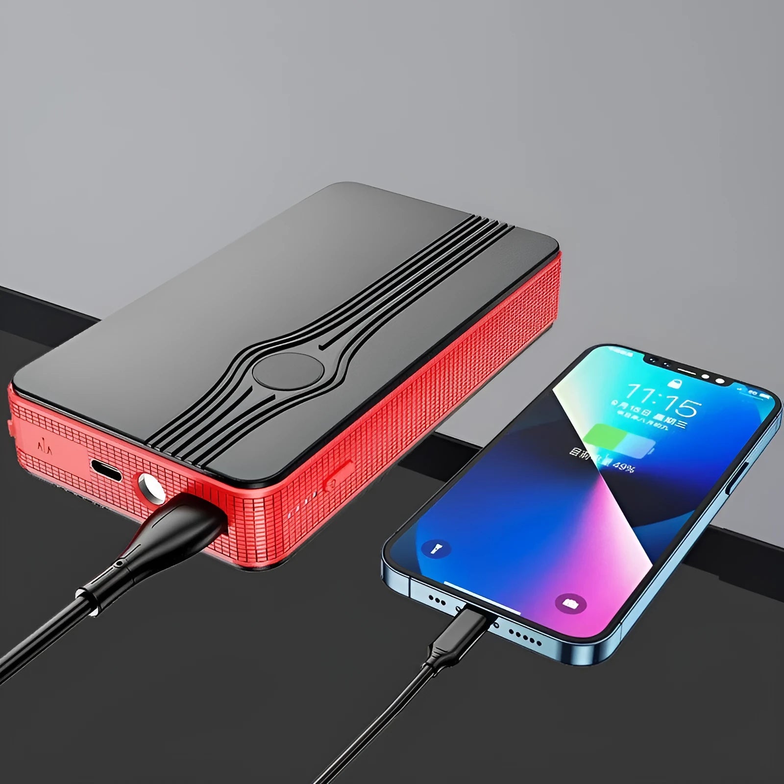 Red K4-E automobile emergency jump starter power bank with data cable, compact rectangular design.