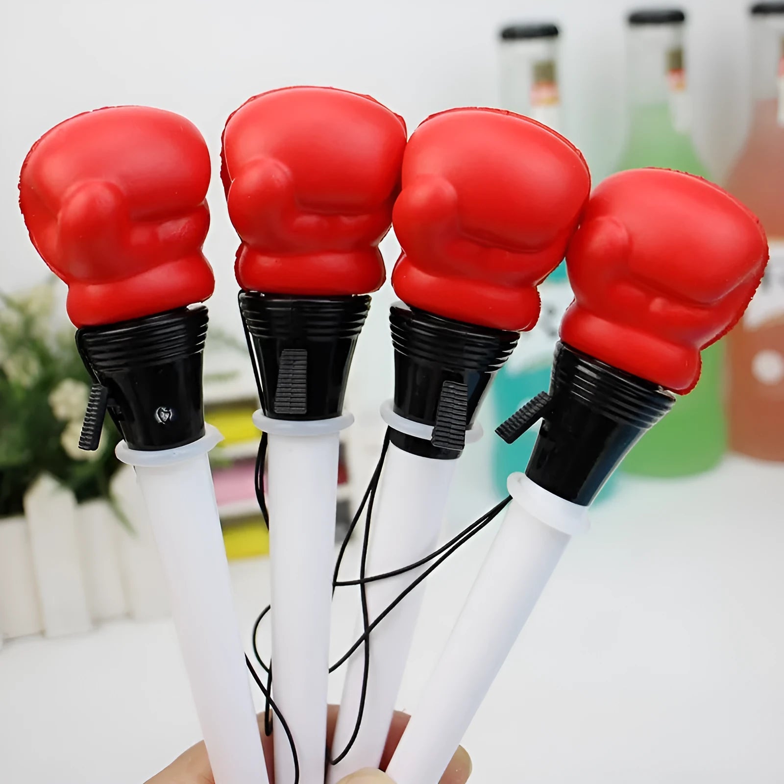 Four boxing press ejection pens with plug-in sleeve mechanisms and 0.7mm bullet tips