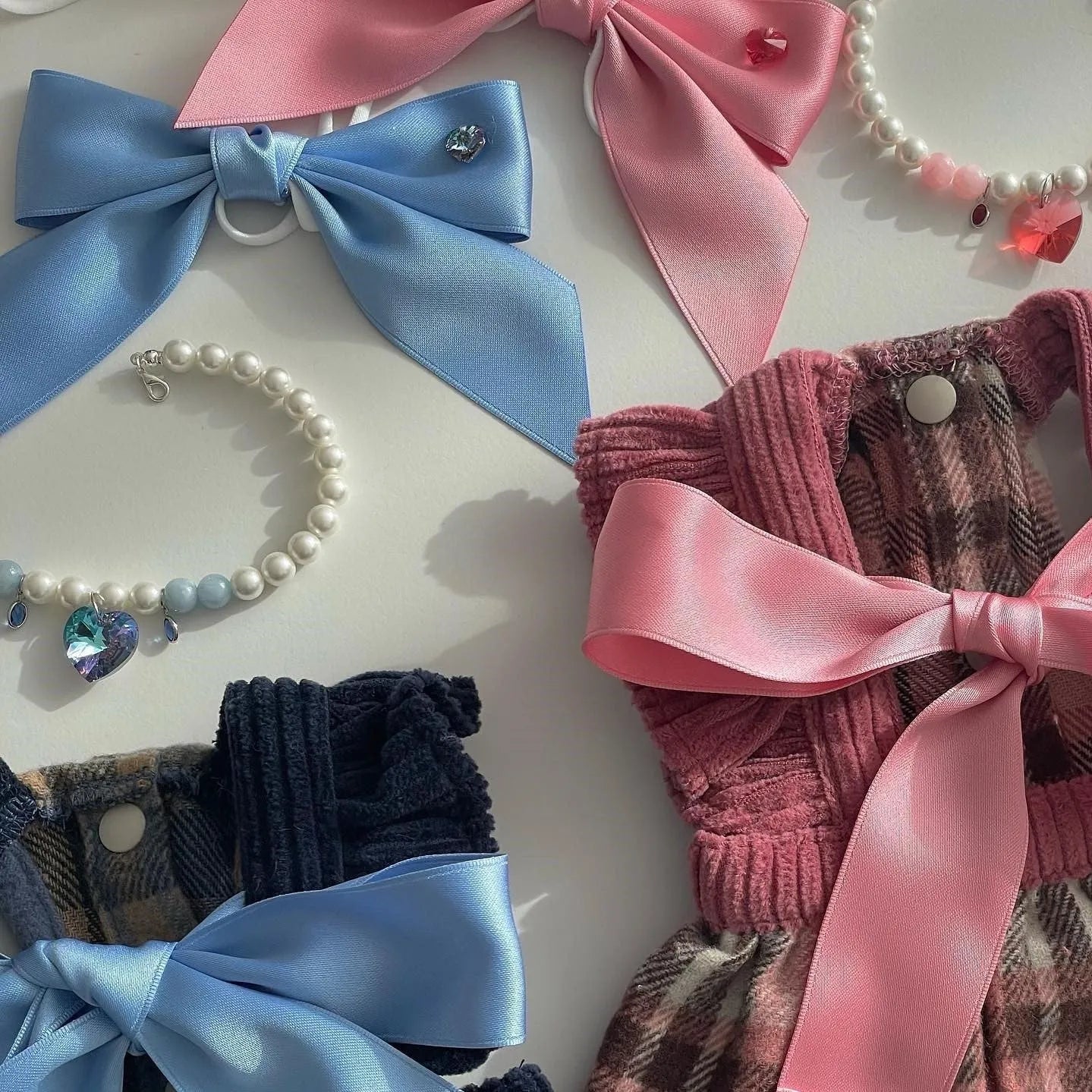 Princess style bow dog hair band with adjustable tension on blue polyester cotton ribbon