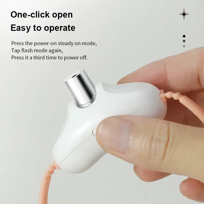 USB rechargeable interactive laser cat teasing collar for self entertainment, Green colour, on a cat