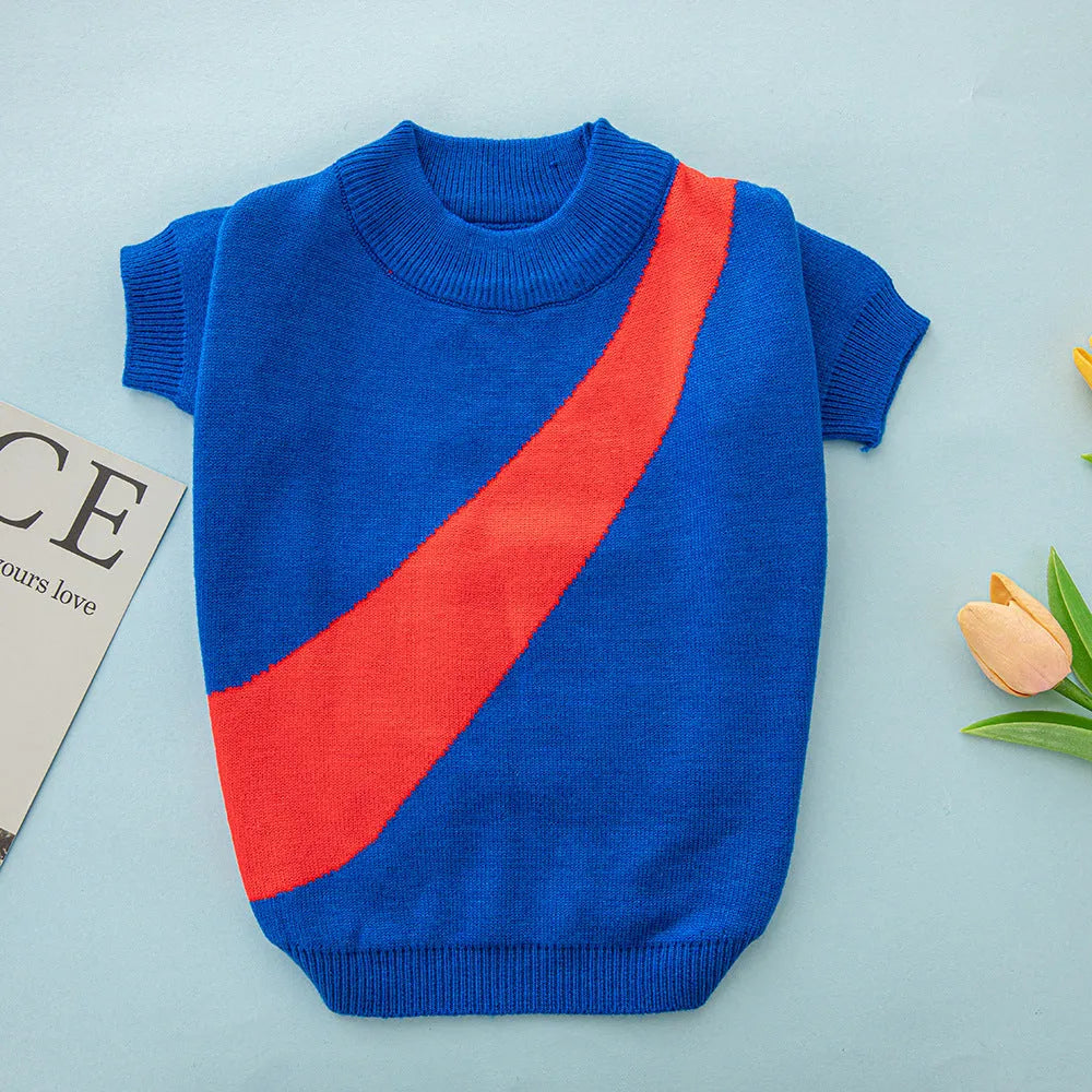 Wool knit sweater for a corgi or poodle dog on a hanger, showing colour options: black, orange red, pink, milky white, light green, sapphire blue.