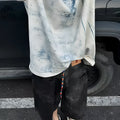 Korean style loose fit round neck T-shirt with short sleeves and a head cover detail.