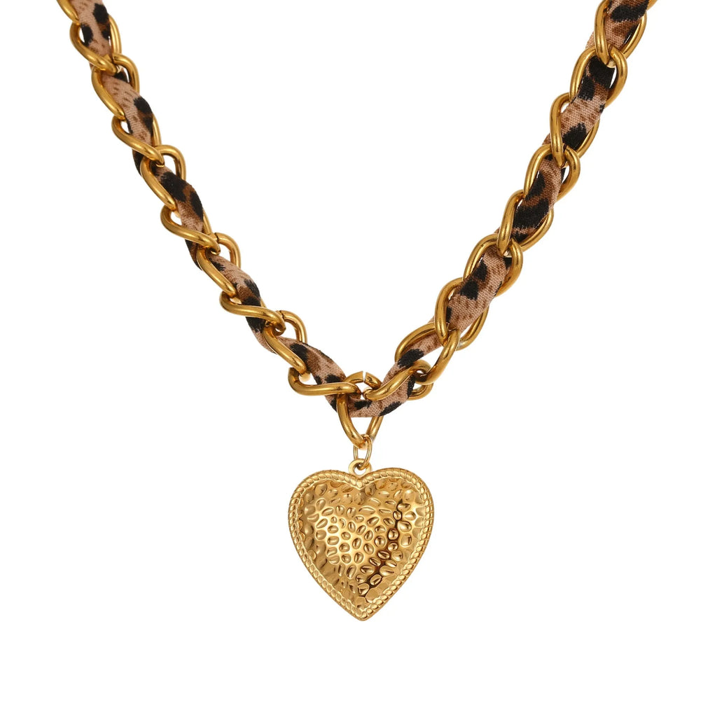 Stainless steel women's necklace with 18K gold electroplating showing geometric pendant design