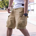 Men's loose-fit cotton blend workwear shorts in army green, shown in a retro style for summer.