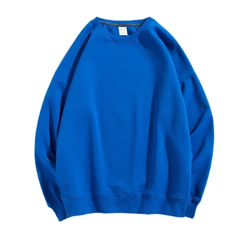 Cotton loose fit off shoulder sweater with round neck and long sleeves in various solid colours
