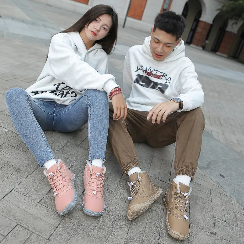 Outdoor snow boots with lace-up front, round toe, and black rubber sole shown in khaki colour.