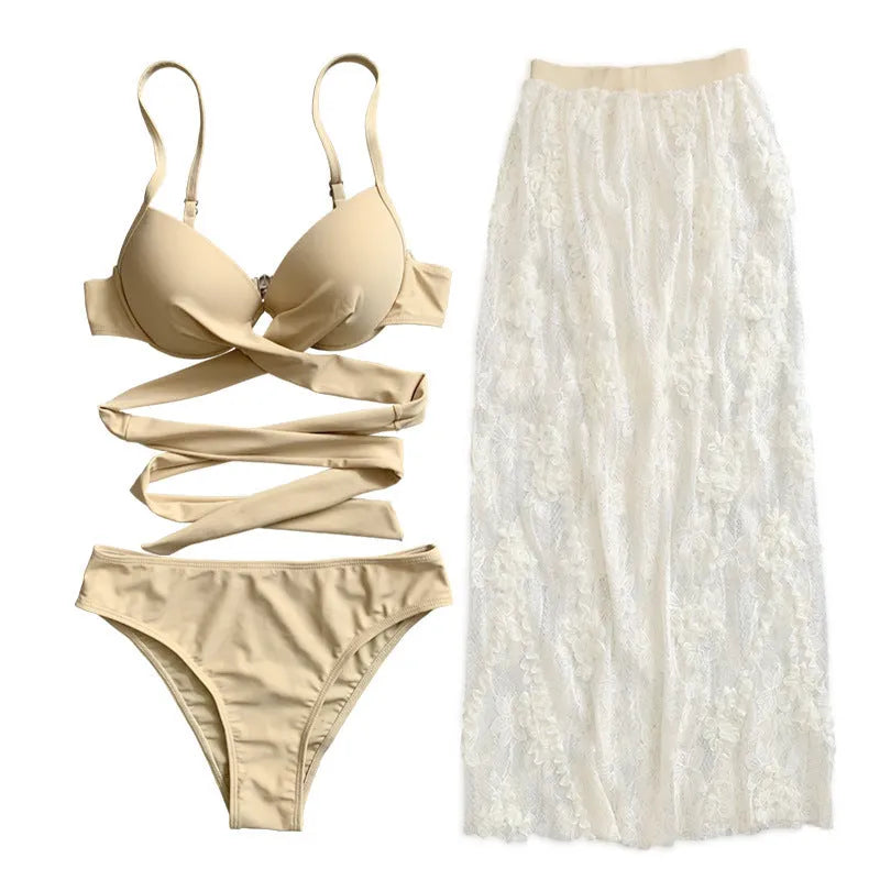Three-piece backless push-up bikini set in solid colour with matching skirt on mannequin